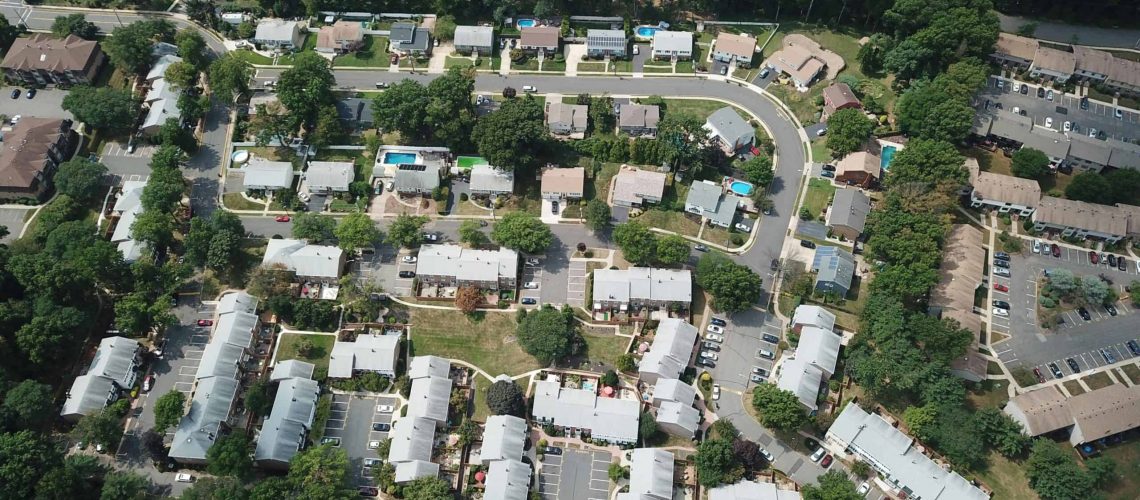 Aerial view of HOA community showing parking challenges and crowded streets.