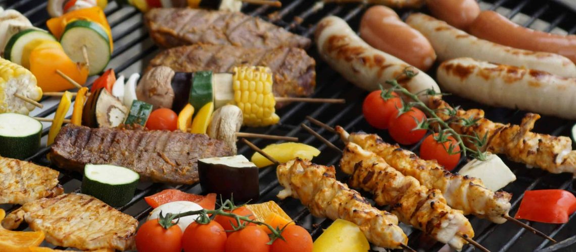 Delicious grilled BBQ skewers with fresh vegetables and meats, perfect for outdoor cooking and Houst.