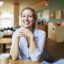 portrait-of-happy-woman-in-a-cafe.jpg